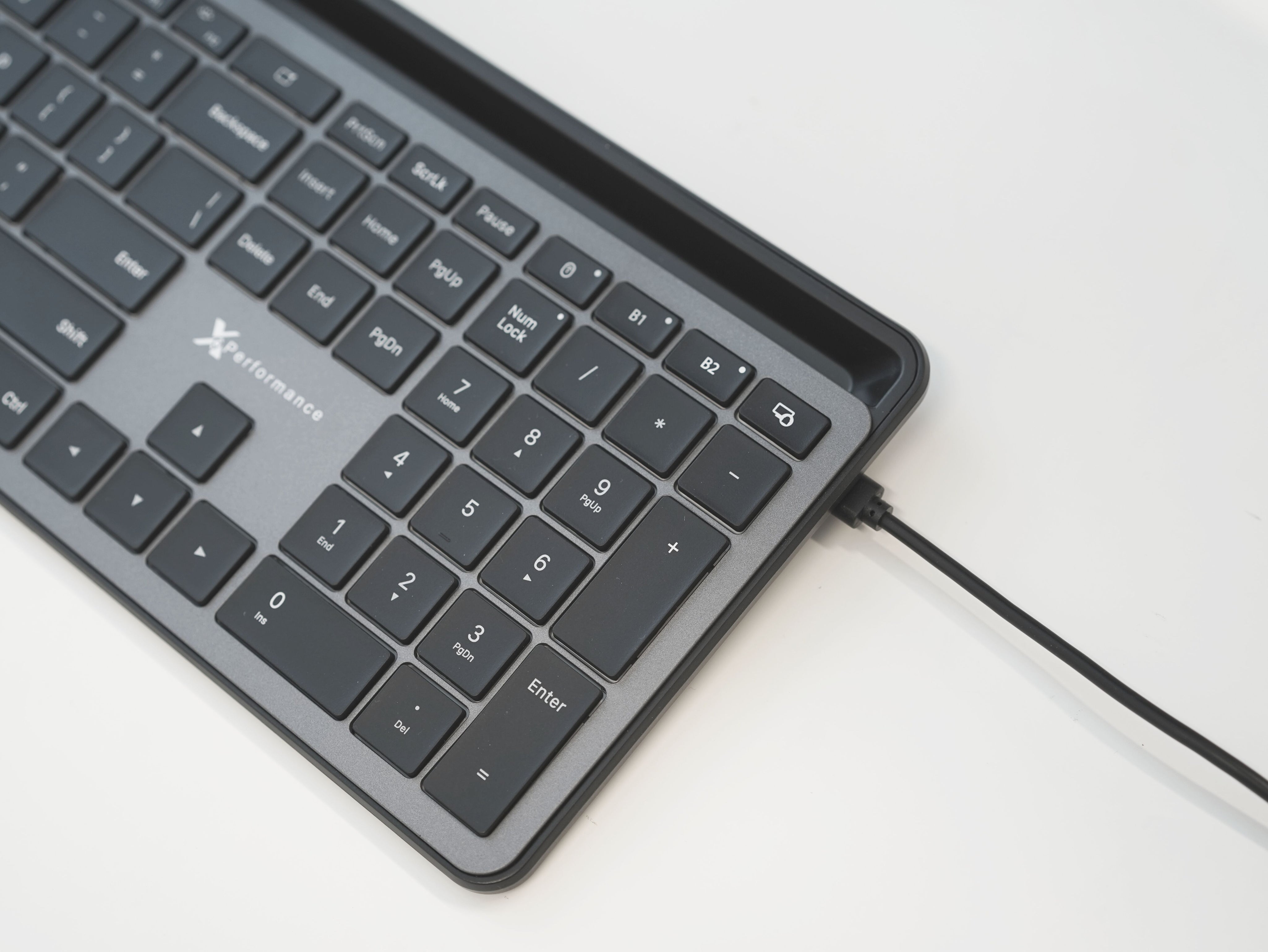 Bluetooth Keyboard with Extra-Long Phone Dock - Multi-Device, Rechargeable, Built-In Tablet Stand